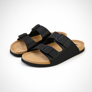 Side view of Loox premium black slippers with contoured footbed and PVC sole for all-day comfort